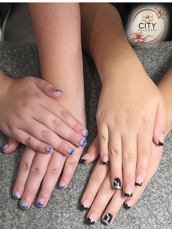 Pink ombre acrylic nails with glitter accent at City Nails & Spa Canton GA